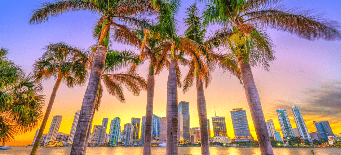 View of Miami, Florida skyline on Bisayne Bay at dusk View of Miami, Florida skyline on Bisayne Bay at dusk