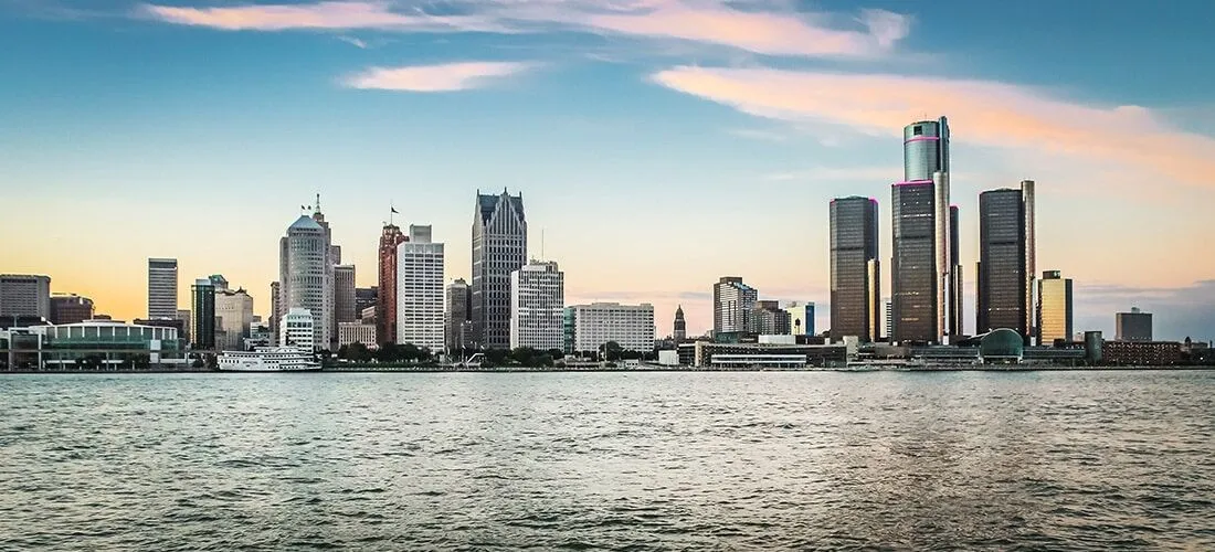 Detroit, MI Skyline Detroit City Skyline at dusk as viewed from Windsor, Ontario, Canada