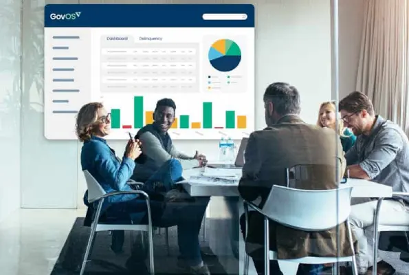 Office-Meeting-looking-at-dashboard Business people working and product dashboard.