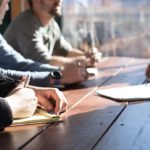 A stock image of people having a meeting.