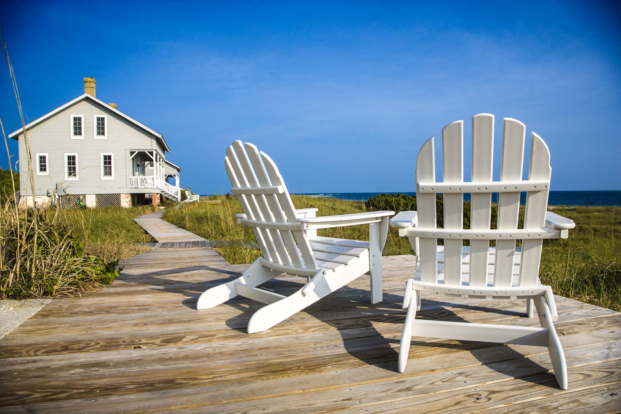 Chairs on Deck Facing Ocean
