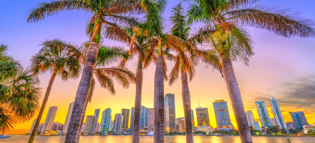 View of Miami, Florida skyline on Bisayne Bay at dusk