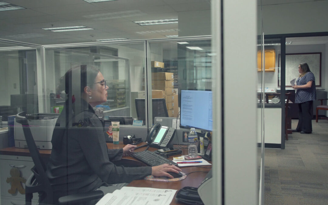 Berks County employee processing a document