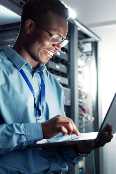 T person adjusting settings in a server room