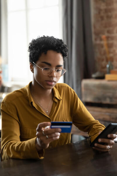 Person making an online payment on their phone